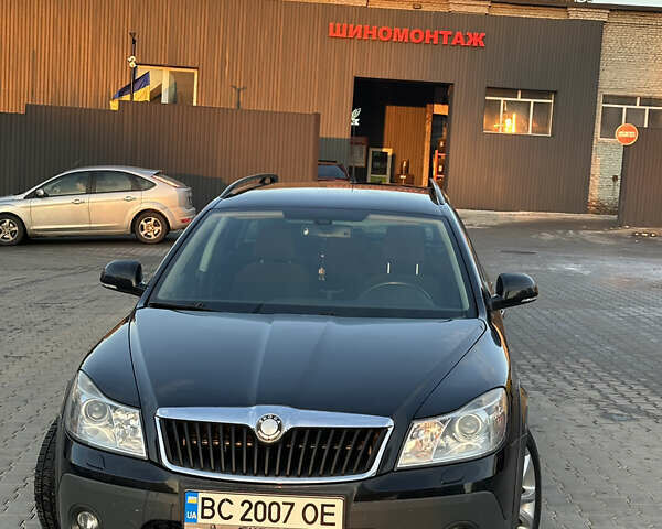 Черный Шкода Октавия Скаут, объемом двигателя 1.97 л и пробегом 210 тыс. км за 10800 $, фото 11 на Automoto.ua