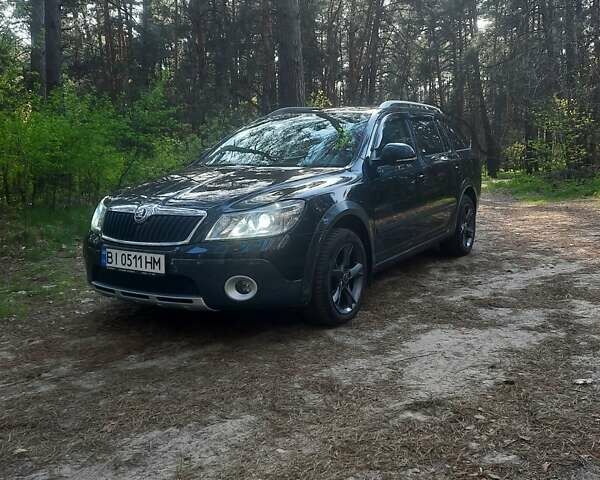 Чорний Шкода Octavia Scout, об'ємом двигуна 2 л та пробігом 263 тис. км за 12900 $, фото 1 на Automoto.ua