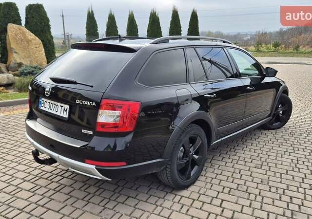 Чорний Шкода Octavia Scout, об'ємом двигуна 2 л та пробігом 295 тис. км за 14900 $, фото 1 на Automoto.ua