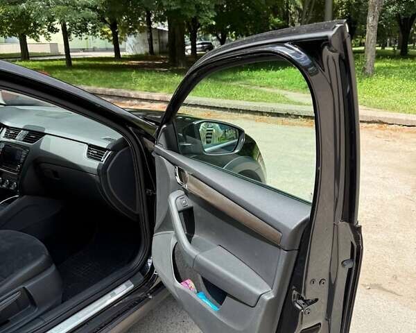 Чорний Шкода Octavia Scout, об'ємом двигуна 2 л та пробігом 177 тис. км за 15990 $, фото 22 на Automoto.ua