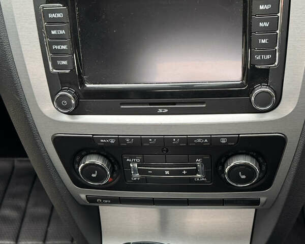 Серый Шкода Октавия Скаут, объемом двигателя 2 л и пробегом 175 тыс. км за 12999 $, фото 51 на Automoto.ua