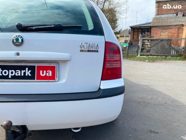 Білий Шкода Октавія Тур, об'ємом двигуна 1.6 л та пробігом 306 тис. км за 4990 $, фото 10 на Automoto.ua