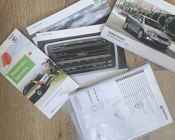 Білий Шкода Октавія, об'ємом двигуна 1.39 л та пробігом 250 тис. км за 7500 $, фото 43 на Automoto.ua