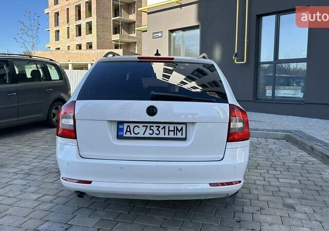 Белый Шкода Октавия, объемом двигателя 1.2 л и пробегом 235 тыс. км за 6900 $, фото 1 на Automoto.ua