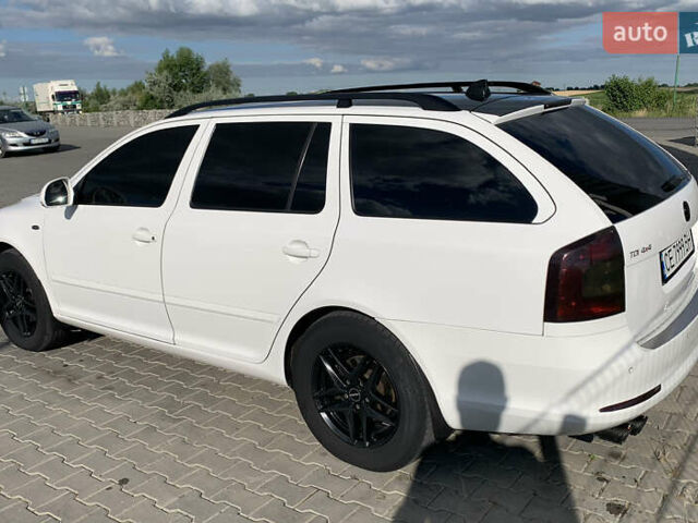 Білий Шкода Октавія, об'ємом двигуна 2 л та пробігом 246 тис. км за 12866 $, фото 4 на Automoto.ua