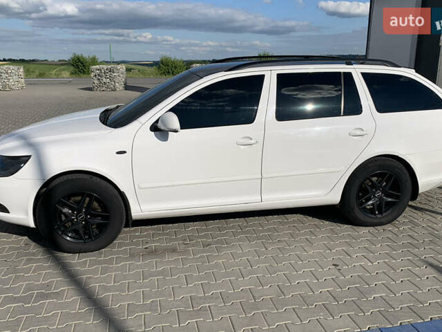 Білий Шкода Октавія, об'ємом двигуна 2 л та пробігом 246 тис. км за 12866 $, фото 3 на Automoto.ua