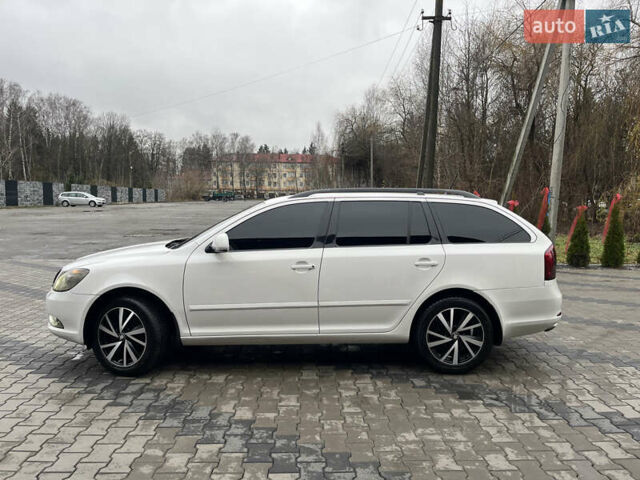 Білий Шкода Октавія, об'ємом двигуна 2 л та пробігом 362 тис. км за 8888 $, фото 5 на Automoto.ua