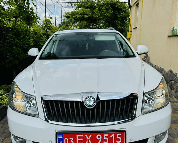 Білий Шкода Октавія, об'ємом двигуна 1.98 л та пробігом 218 тис. км за 11299 $, фото 1 на Automoto.ua