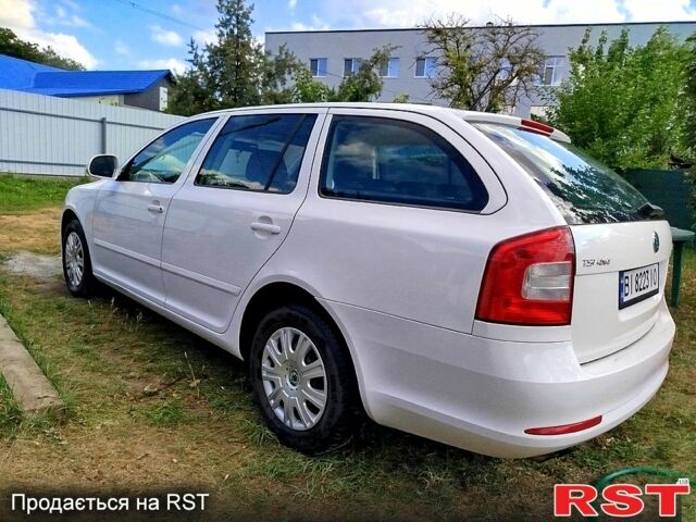 Белый Шкода Октавия, объемом двигателя 1.8 л и пробегом 222 тыс. км за 8400 $, фото 1 на Automoto.ua