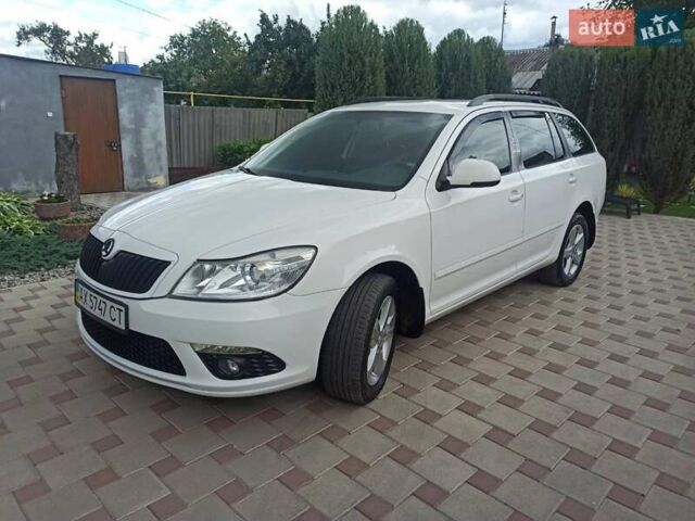 Белый Шкода Октавия, объемом двигателя 1.8 л и пробегом 125 тыс. км за 9900 $, фото 2 на Automoto.ua