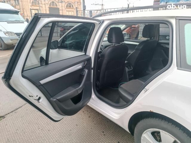 Білий Шкода Октавія, об'ємом двигуна 2 л та пробігом 328 тис. км за 8990 $, фото 23 на Automoto.ua