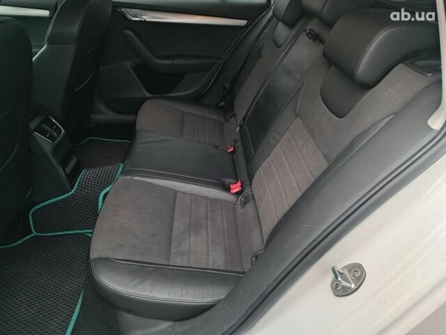 Білий Шкода Октавія, об'ємом двигуна 2 л та пробігом 328 тис. км за 8990 $, фото 22 на Automoto.ua