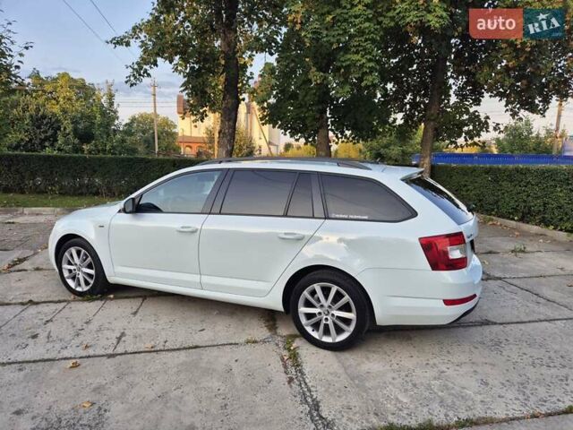 Білий Шкода Октавія, об'ємом двигуна 2 л та пробігом 195 тис. км за 11599 $, фото 22 на Automoto.ua
