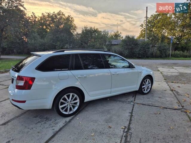 Білий Шкода Октавія, об'ємом двигуна 2 л та пробігом 195 тис. км за 11599 $, фото 16 на Automoto.ua