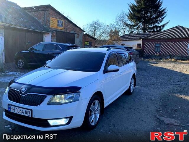 Белый Шкода Октавия, объемом двигателя 2 л и пробегом 235 тыс. км за 12500 $, фото 4 на Automoto.ua
