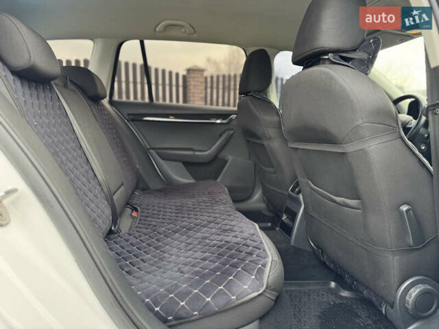 Білий Шкода Октавія, об'ємом двигуна 1.8 л та пробігом 216 тис. км за 14190 $, фото 17 на Automoto.ua