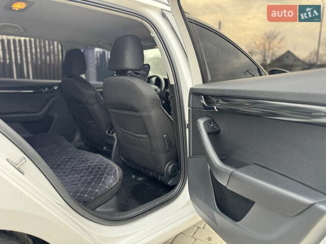 Білий Шкода Октавія, об'ємом двигуна 1.8 л та пробігом 216 тис. км за 14190 $, фото 16 на Automoto.ua