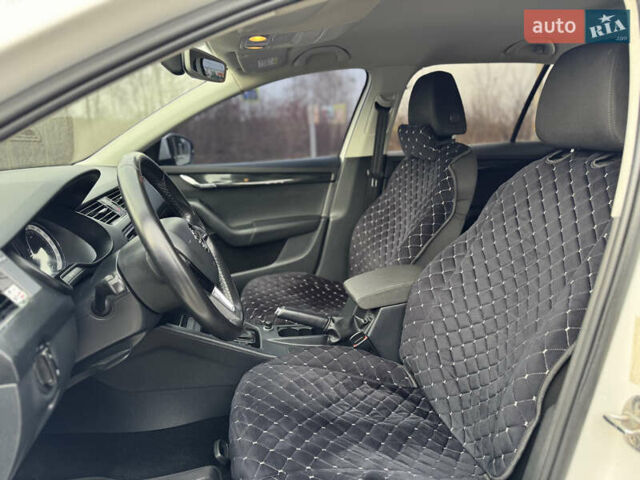 Білий Шкода Октавія, об'ємом двигуна 1.8 л та пробігом 216 тис. км за 14190 $, фото 24 на Automoto.ua