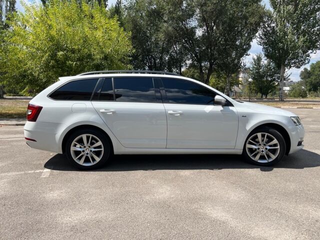 Белый Шкода Октавия, объемом двигателя 2 л и пробегом 209 тыс. км за 16990 $, фото 5 на Automoto.ua