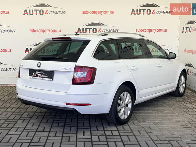 Белый Шкода Октавия, объемом двигателя 1.6 л и пробегом 209 тыс. км за 15950 $, фото 2 на Automoto.ua