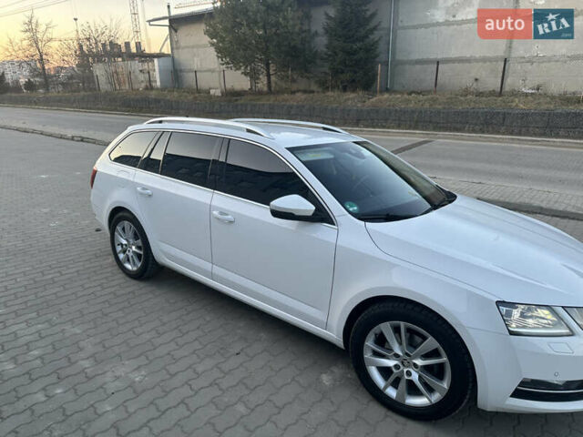 Білий Шкода Октавія, об'ємом двигуна 2 л та пробігом 197 тис. км за 18400 $, фото 4 на Automoto.ua