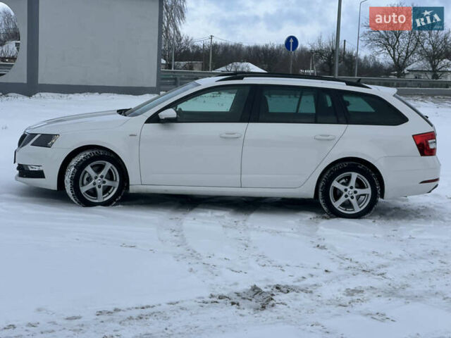 Білий Шкода Октавія, об'ємом двигуна 2.01 л та пробігом 235 тис. км за 14000 $, фото 1 на Automoto.ua