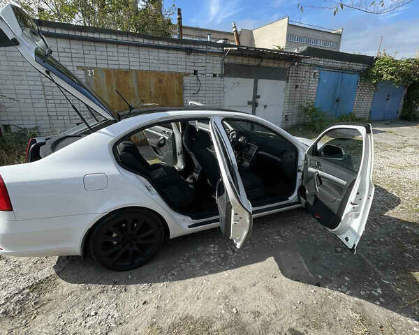 Шкода Октавия 2012 в Днепре (Днепропетровске) на Automoto.ua Белый Шкода Октавия, объемом двигателя 1.8 л и пробегом 225 тыс. км за 9000 $, фото 8 на Automoto.ua