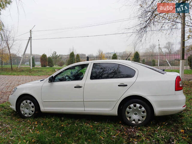 Білий Шкода Октавія, об'ємом двигуна 1.4 л та пробігом 207 тис. км за 7700 $, фото 7 на Automoto.ua