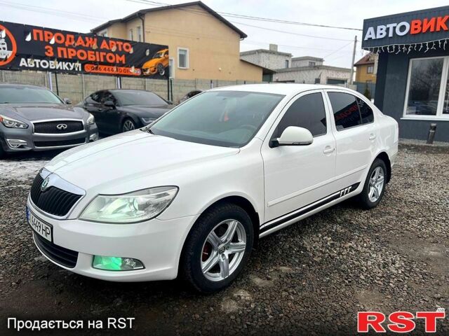 Белый Шкода Октавия, объемом двигателя 1.8 л и пробегом 249 тыс. км за 7499 $, фото 1 на Automoto.ua