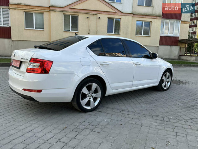 Шкода Октавия 2014 в Каменце-Подольском на Automoto.ua Белый Шкода Октавия, объемом двигателя 1.6 л и пробегом 180 тыс. км за 10800 $, фото 14 на Automoto.ua