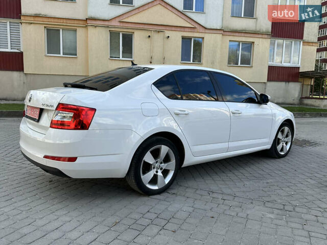 Шкода Октавия 2014 в Каменце-Подольском на Automoto.ua Белый Шкода Октавия, объемом двигателя 1.6 л и пробегом 180 тыс. км за 10800 $, фото 13 на Automoto.ua