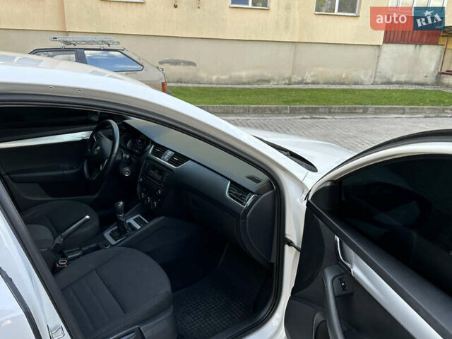 Шкода Октавия 2014 в Каменце-Подольском на Automoto.ua Белый Шкода Октавия, объемом двигателя 1.6 л и пробегом 180 тыс. км за 10800 $, фото 25 на Automoto.ua