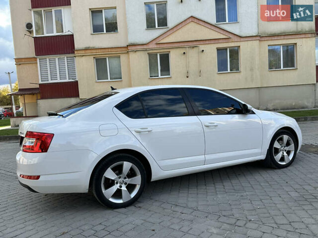 Шкода Октавия 2014 в Каменце-Подольском на Automoto.ua Белый Шкода Октавия, объемом двигателя 1.6 л и пробегом 180 тыс. км за 10800 $, фото 8 на Automoto.ua