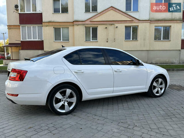 Шкода Октавия 2014 в Каменце-Подольском на Automoto.ua Белый Шкода Октавия, объемом двигателя 1.6 л и пробегом 180 тыс. км за 10800 $, фото 30 на Automoto.ua