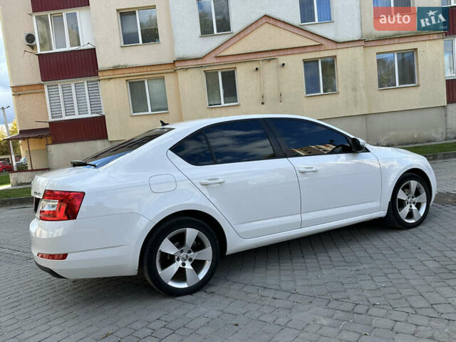 Шкода Октавия 2014 в Каменце-Подольском на Automoto.ua Белый Шкода Октавия, объемом двигателя 1.6 л и пробегом 180 тыс. км за 10800 $, фото 9 на Automoto.ua