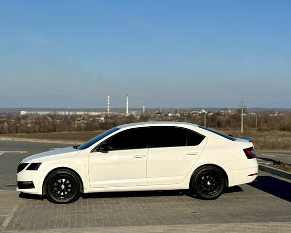 Білий Шкода Октавія, об'ємом двигуна 1.4 л та пробігом 94 тис. км за 16500 $, фото 1 на Automoto.ua