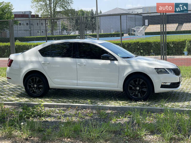 Білий Шкода Октавія, об'ємом двигуна 2 л та пробігом 245 тис. км за 16600 $, фото 5 на Automoto.ua