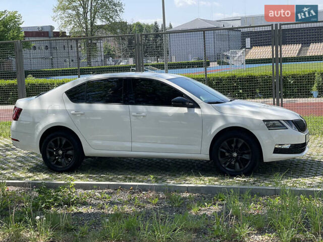 Білий Шкода Октавія, об'ємом двигуна 2 л та пробігом 245 тис. км за 16600 $, фото 6 на Automoto.ua