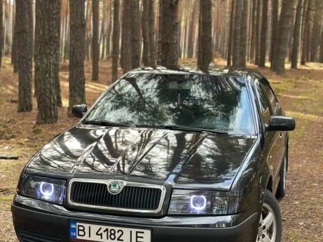 Черный Шкода Октавия, объемом двигателя 2 л и пробегом 423 тыс. км за 5200 $, фото 1 на Automoto.ua