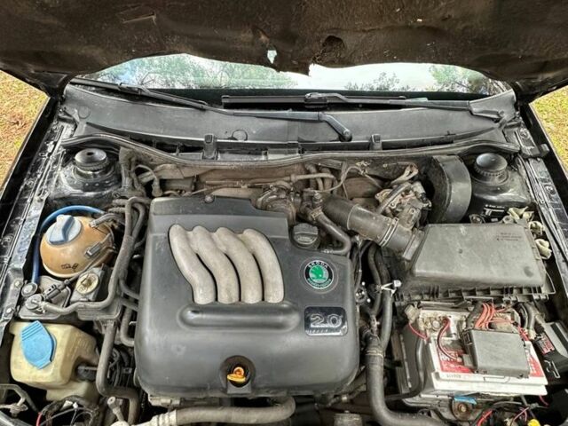 Черный Шкода Октавия, объемом двигателя 2 л и пробегом 423 тыс. км за 5200 $, фото 7 на Automoto.ua