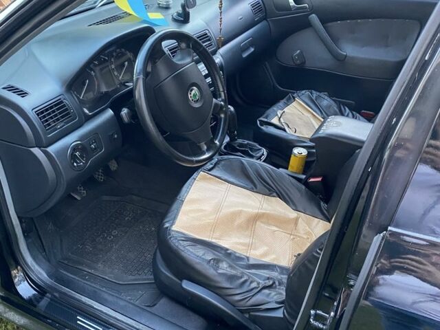 Чорний Шкода Октавія, об'ємом двигуна 1 л та пробігом 440 тис. км за 3300 $, фото 3 на Automoto.ua