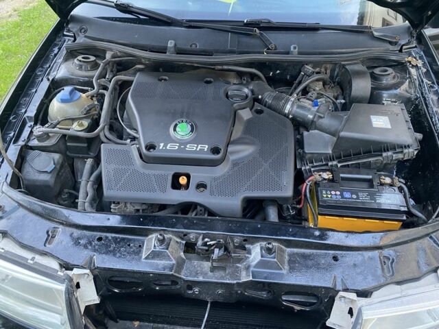 Черный Шкода Октавия, объемом двигателя 1 л и пробегом 440 тыс. км за 3000 $, фото 2 на Automoto.ua