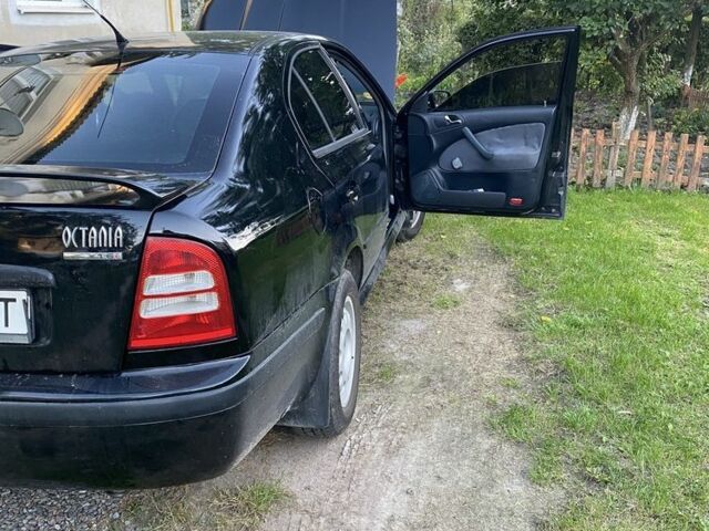 Чорний Шкода Октавія, об'ємом двигуна 1 л та пробігом 440 тис. км за 3300 $, фото 4 на Automoto.ua