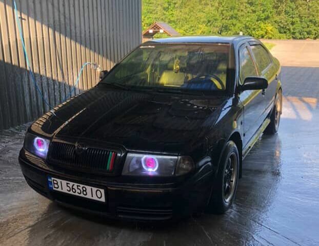 Черный Шкода Октавия, объемом двигателя 1.8 л и пробегом 440 тыс. км за 4800 $, фото 14 на Automoto.ua
