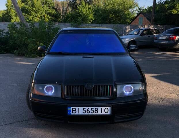 Черный Шкода Октавия, объемом двигателя 1.8 л и пробегом 440 тыс. км за 4800 $, фото 11 на Automoto.ua