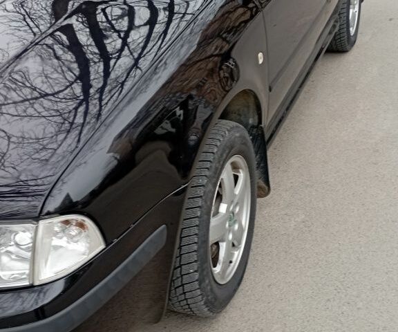Черный Шкода Октавия, объемом двигателя 1.8 л и пробегом 300 тыс. км за 5200 $, фото 7 на Automoto.ua