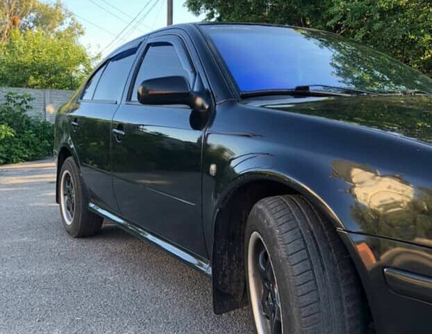 Черный Шкода Октавия, объемом двигателя 1.8 л и пробегом 440 тыс. км за 4800 $, фото 13 на Automoto.ua