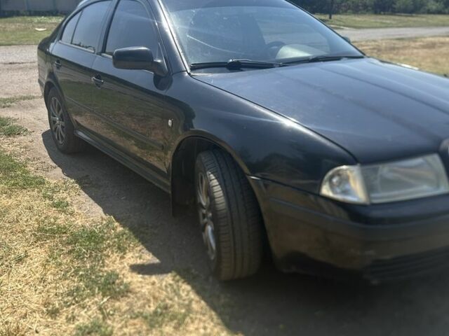 Чорний Шкода Октавія, об'ємом двигуна 1.6 л та пробігом 290 тис. км за 4000 $, фото 1 на Automoto.ua