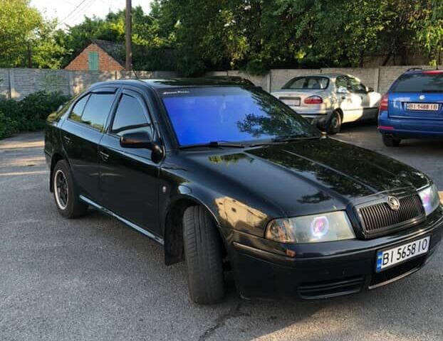 Черный Шкода Октавия, объемом двигателя 1.8 л и пробегом 440 тыс. км за 4800 $, фото 3 на Automoto.ua