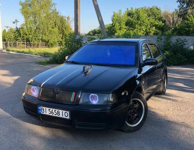 Черный Шкода Октавия, объемом двигателя 1.8 л и пробегом 440 тыс. км за 4800 $, фото 2 на Automoto.ua